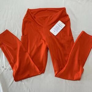 New Fabletics High Waisted 7/8 Side Pockets Legging Orange Sz Large Compression​